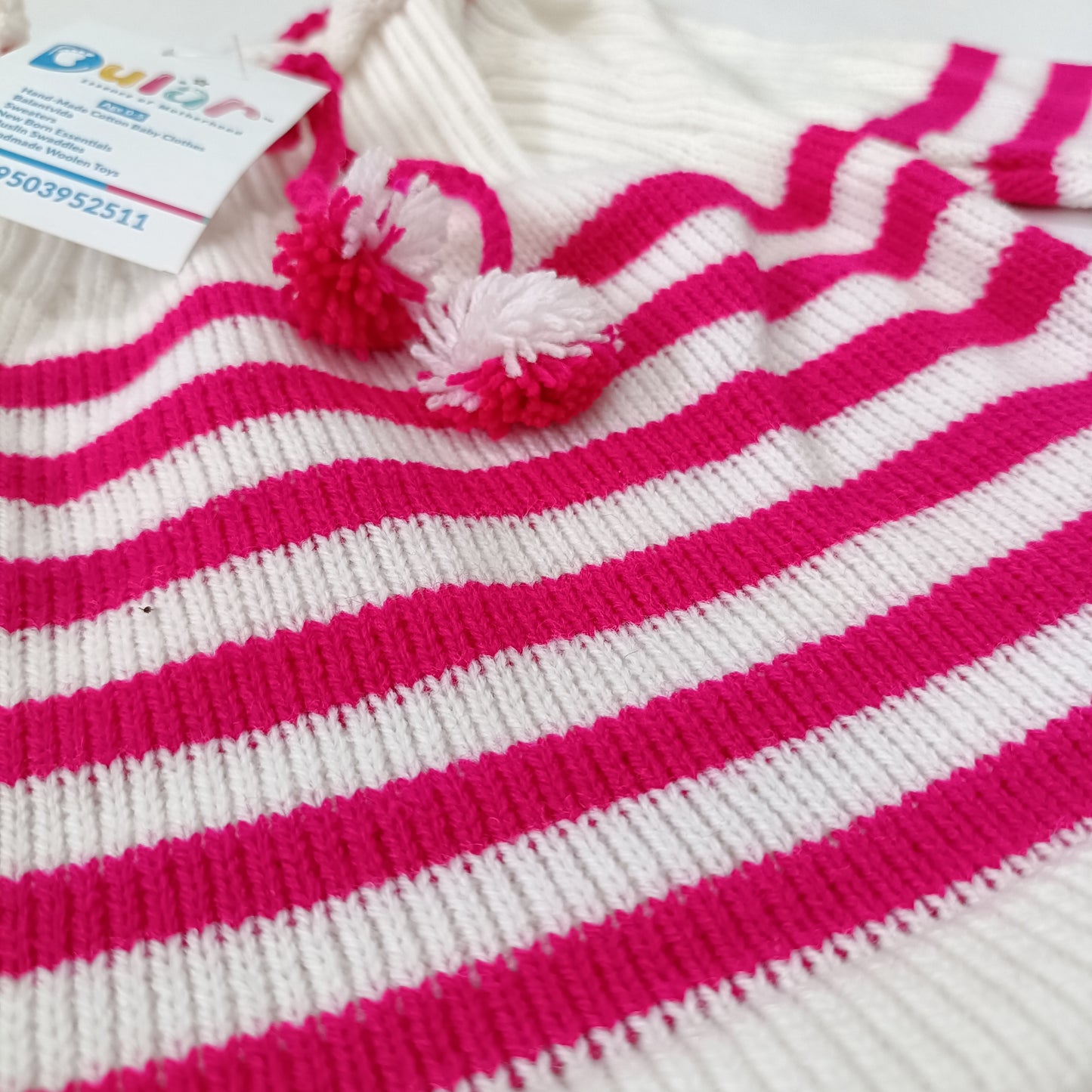 dular | baby sweater
