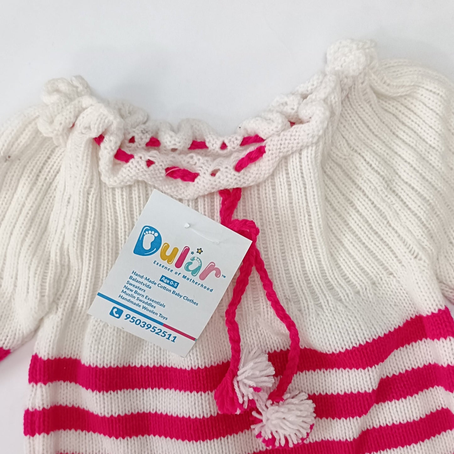 dular | baby sweater