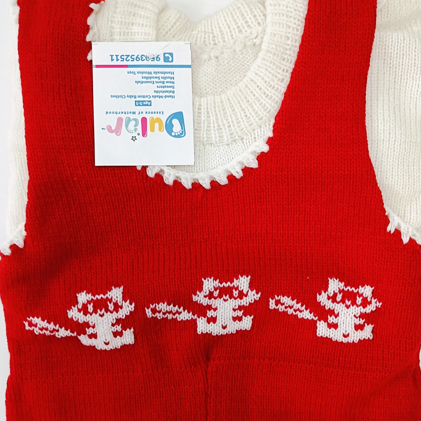 dular | baby sweater