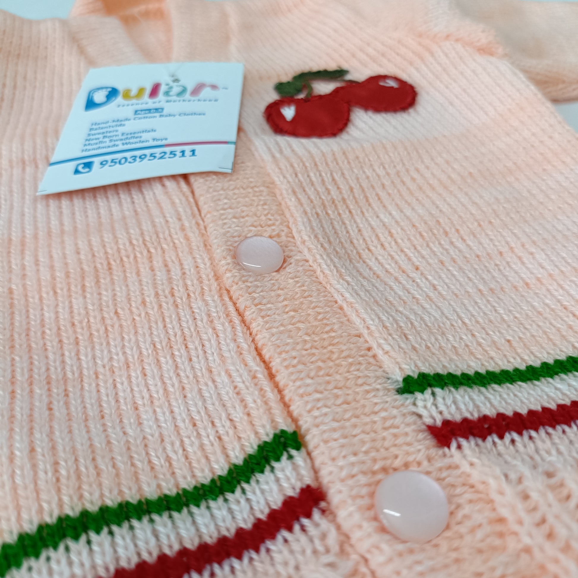 dular | baby sweater