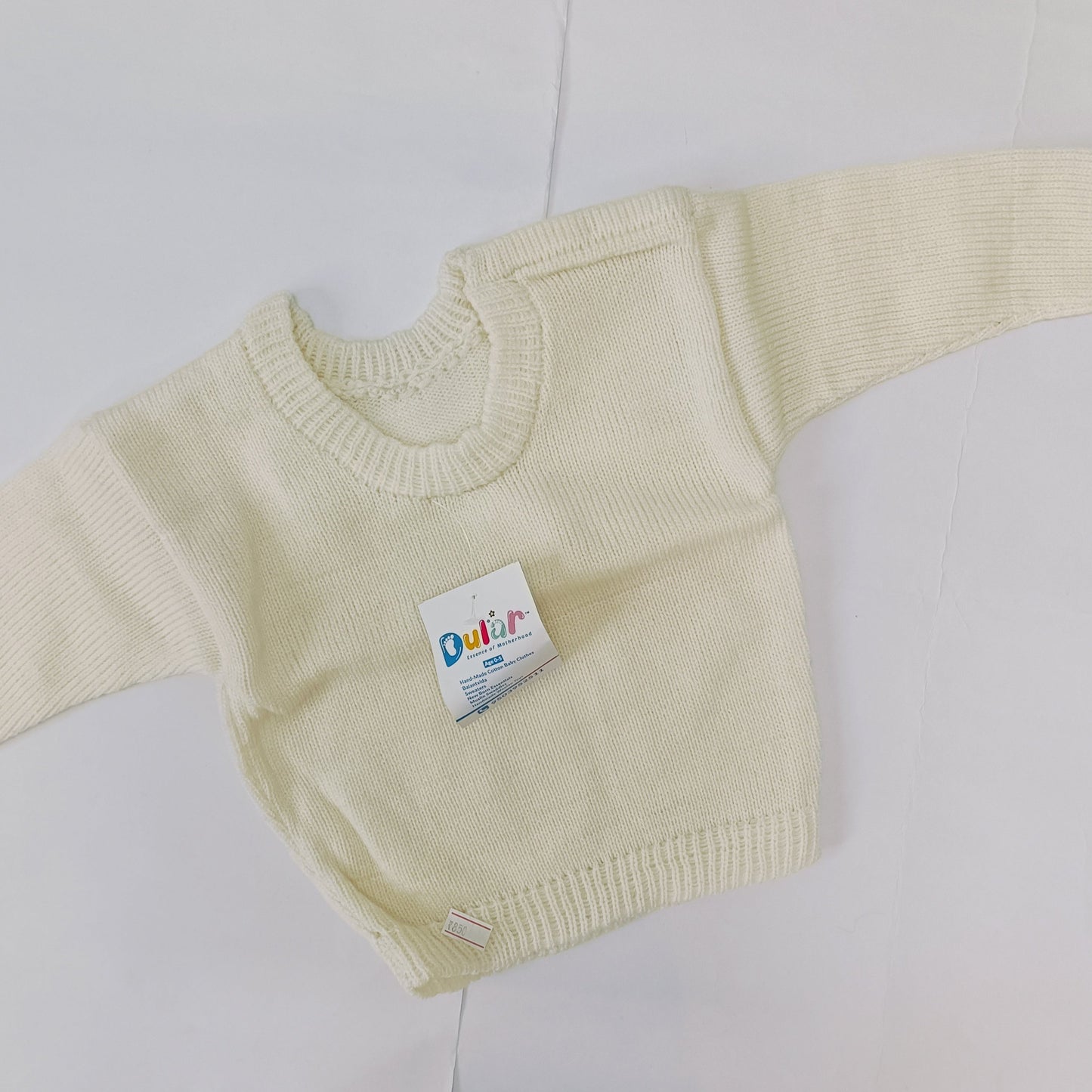 dular | baby sweater