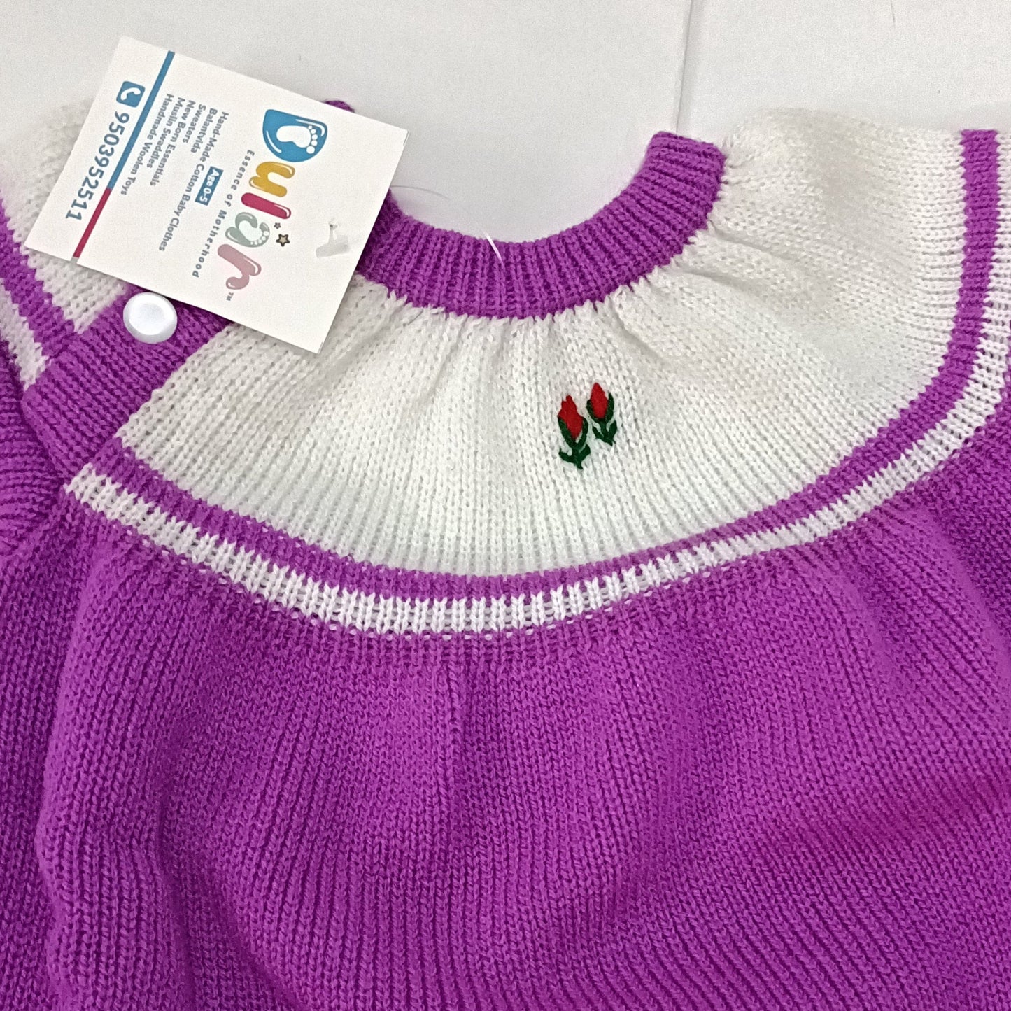 dular | baby sweater