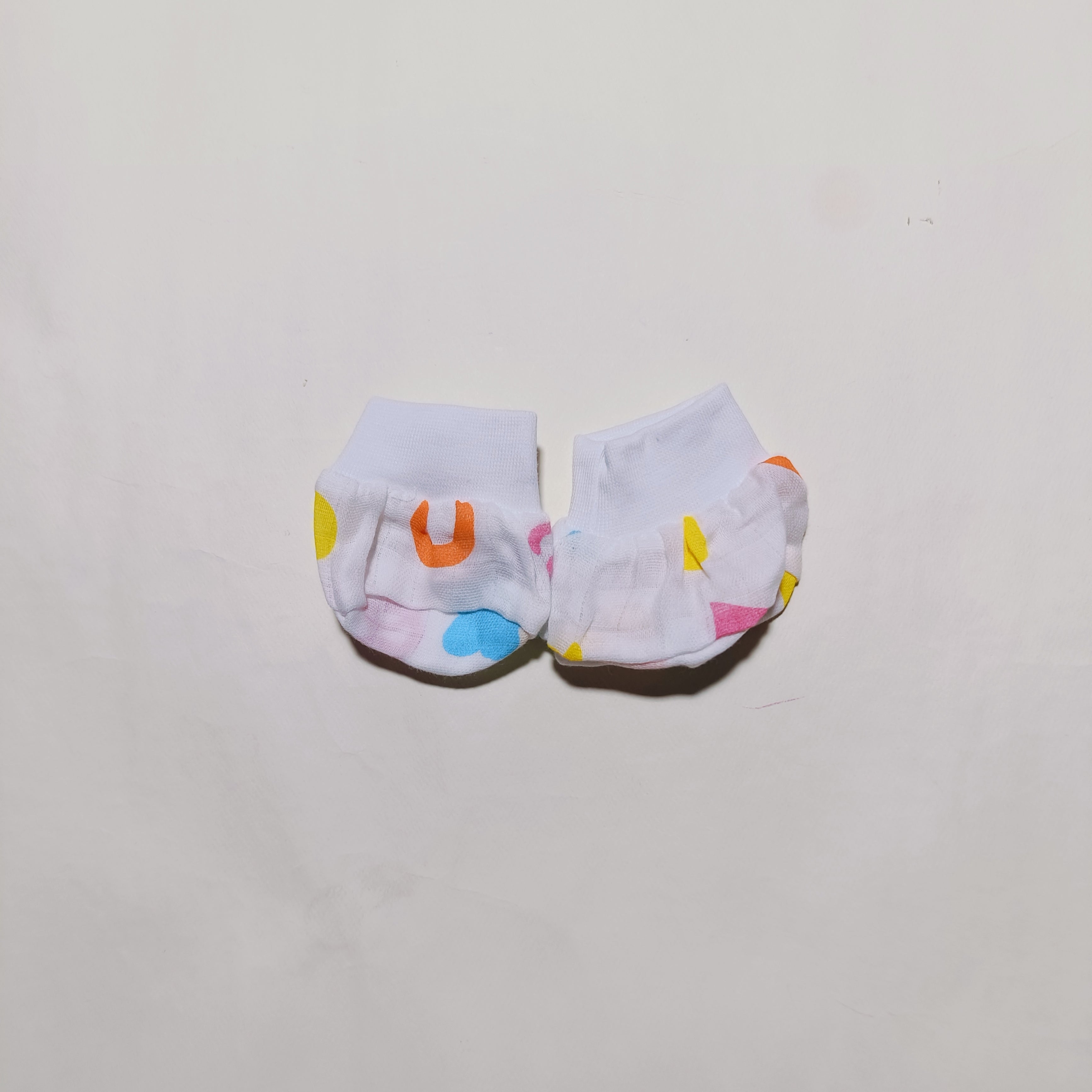 Muslin Cap, Mittens, Socks | Geometry