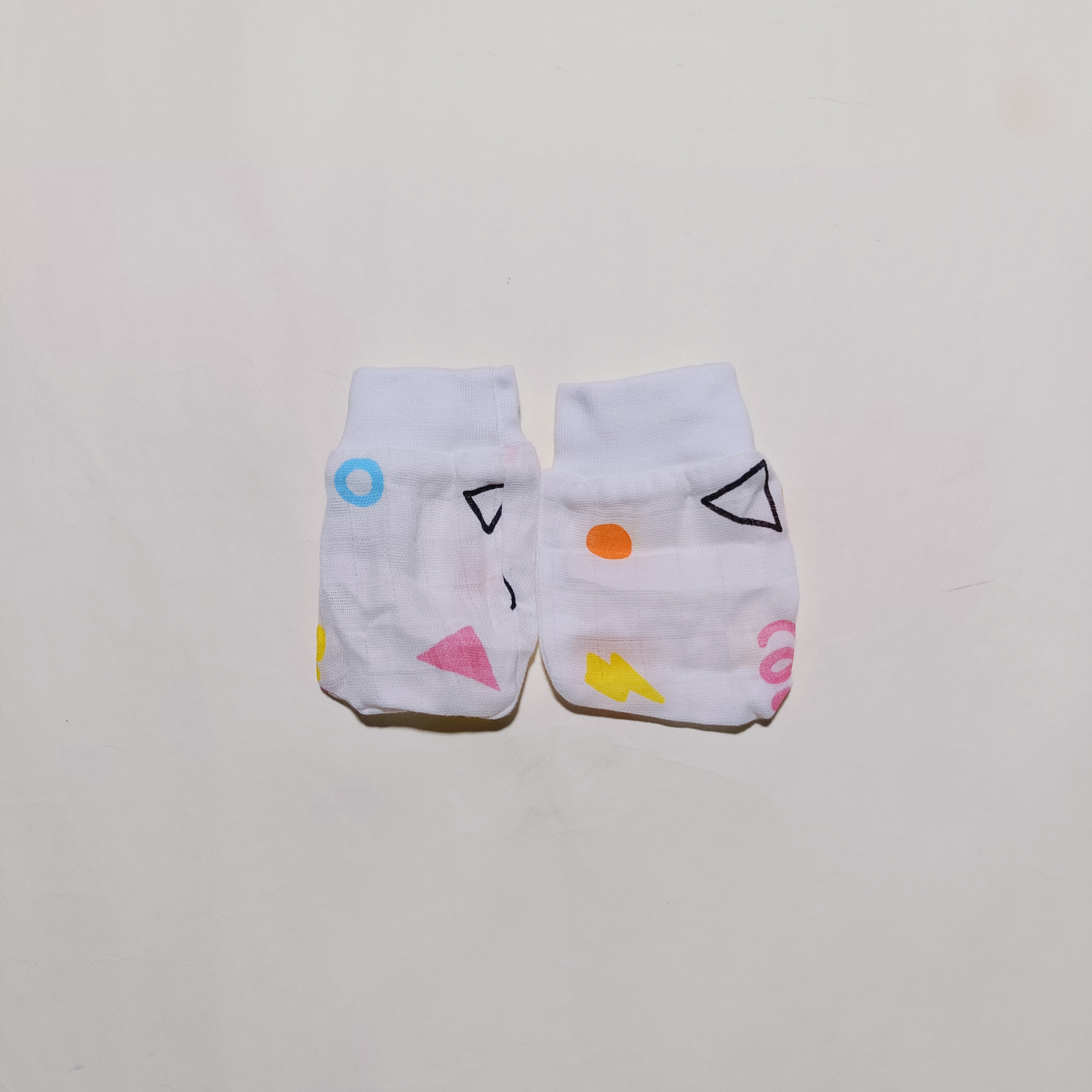 Muslin Cap, Mittens, Socks | Geometry