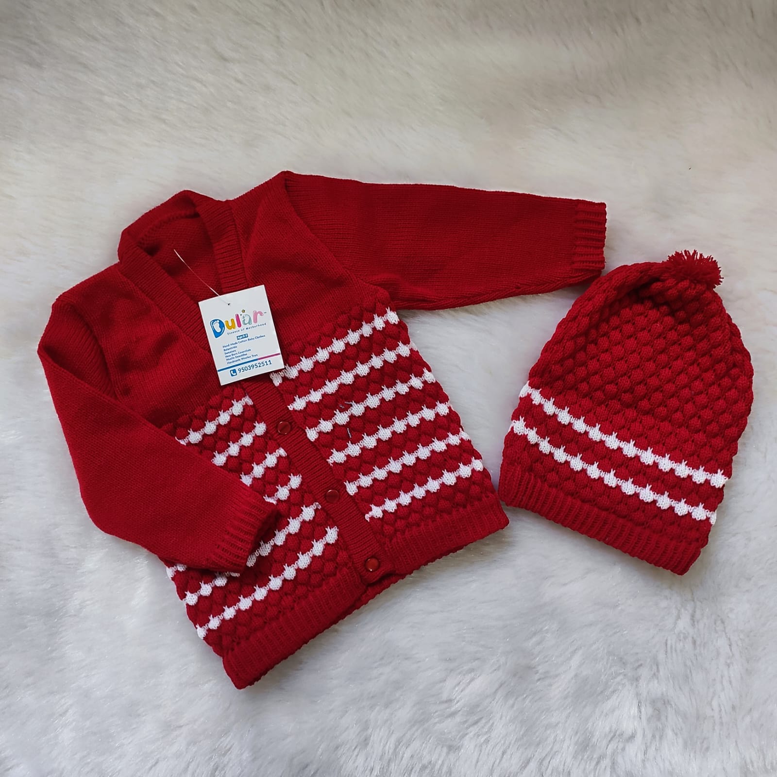 dular | baby sweater